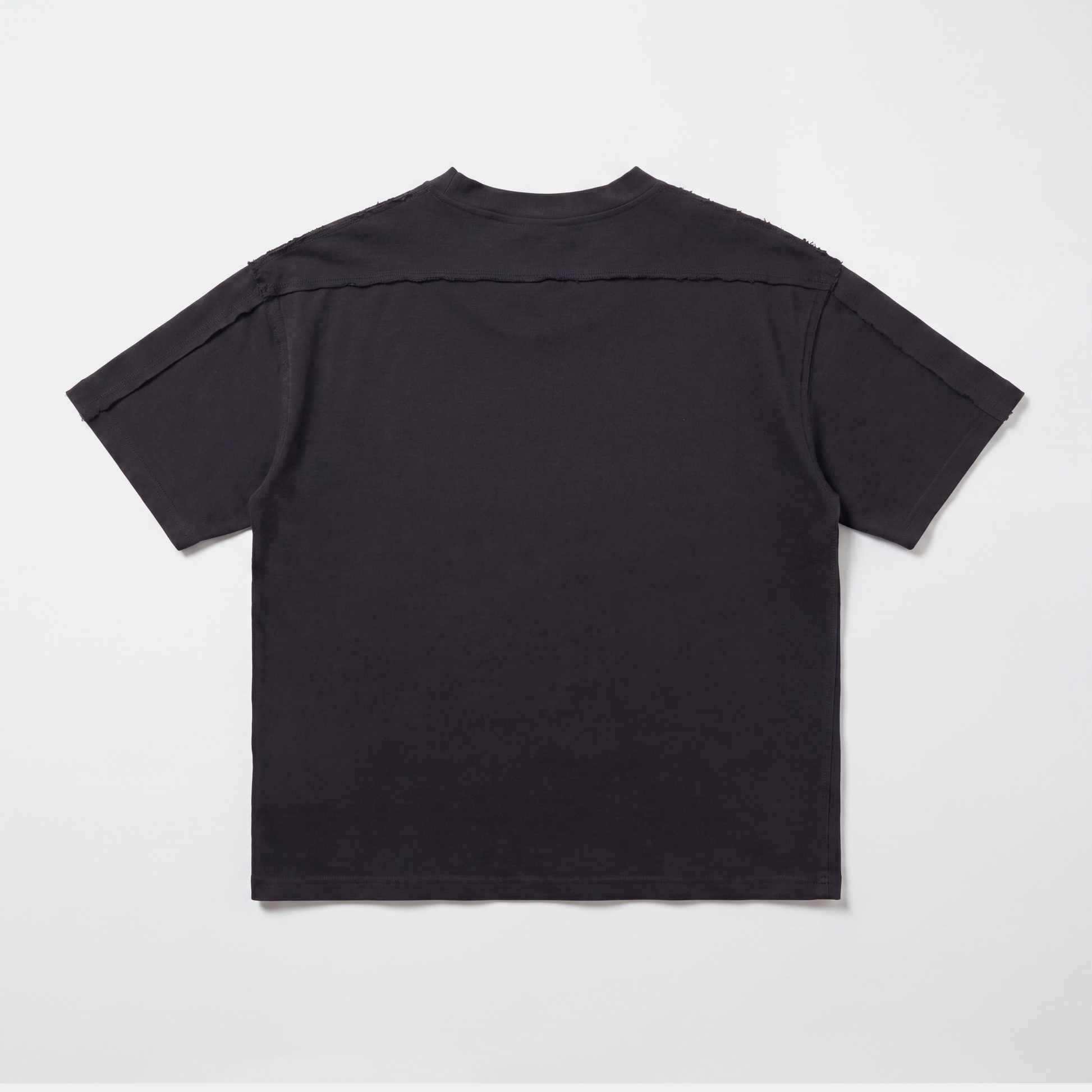 Black AVALIN tee, distressed detailing across shoulders and triceps, full back view. Heavyweight boxed fitted t-shirt.