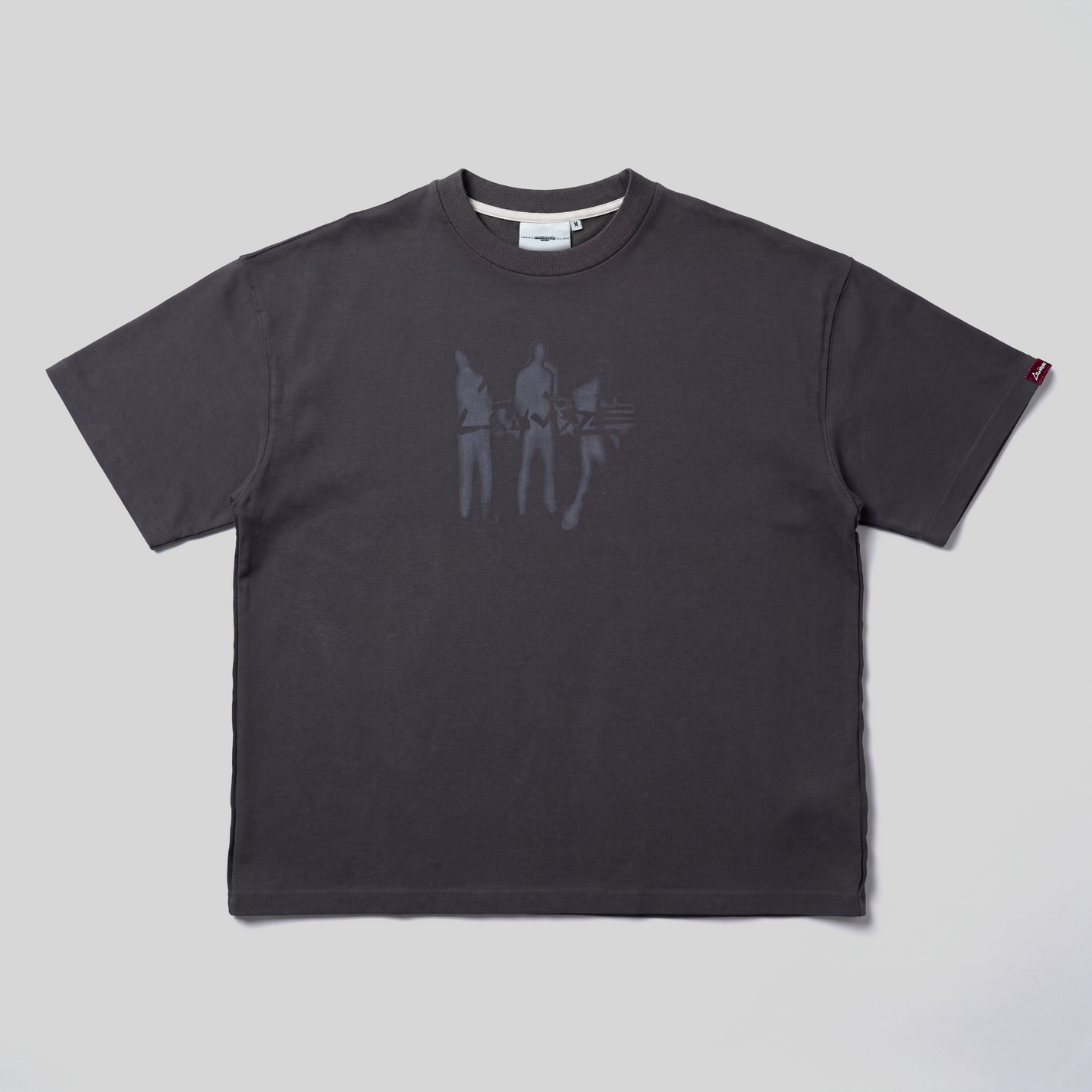 Black AVALIN tee, plastisol screen print logo at centre chest, straight-on view. Heavyweight boxed fitted t-shirt.
